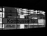 The photo shows the Kottbusser Tor subway station in Berlin-Kreuzberg.