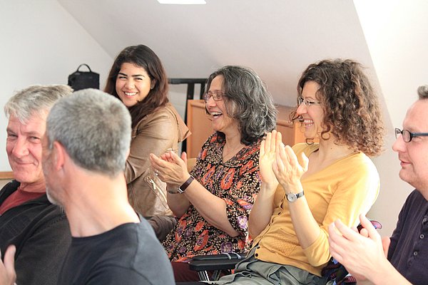 Natalia smiling at her theatre group