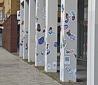 Pillars of the ASH covered with MINIMAS - Hellersdorf's mascot